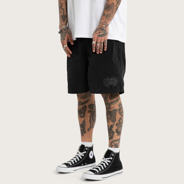 Model wears Mosh Baggy Short 2.0 Jet Black Shorts Black – image 2