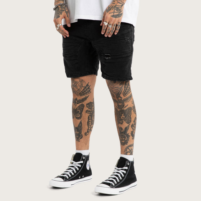 Model wears Raze Denim Shorts Washed Black Shorts Black – image 2