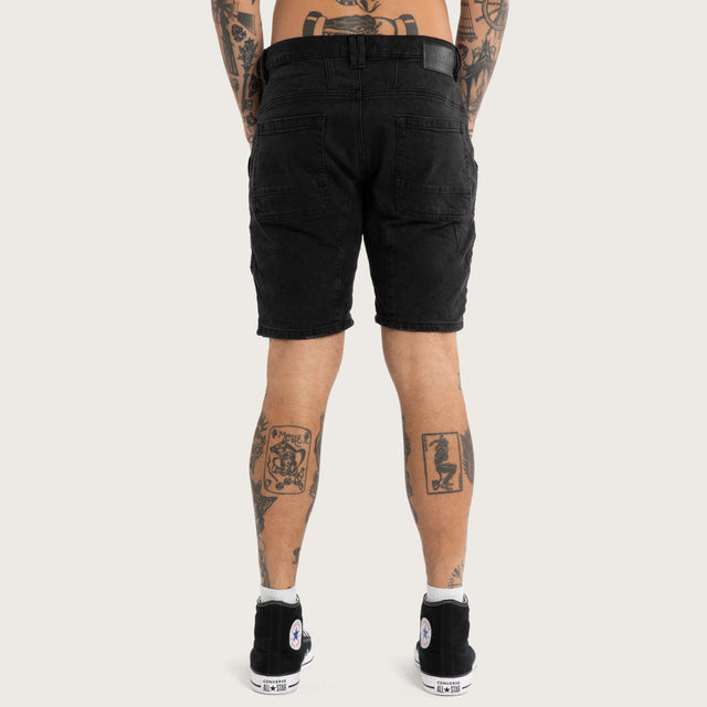 Model wears Raze Denim Shorts Washed Black Shorts Black – image 4