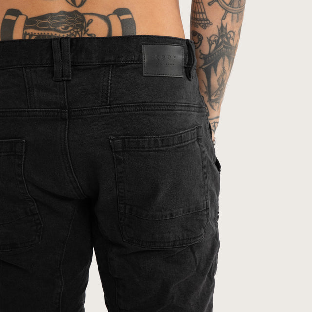 Model wears Raze Denim Shorts Washed Black Shorts Black – image 5