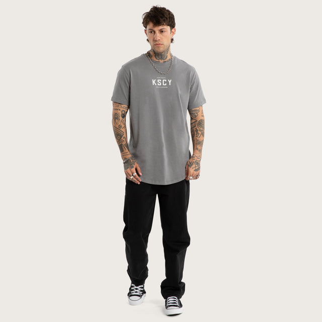 Model wears Division Dual Curved Tee Steel Grey T-Shirts Grey – image 5