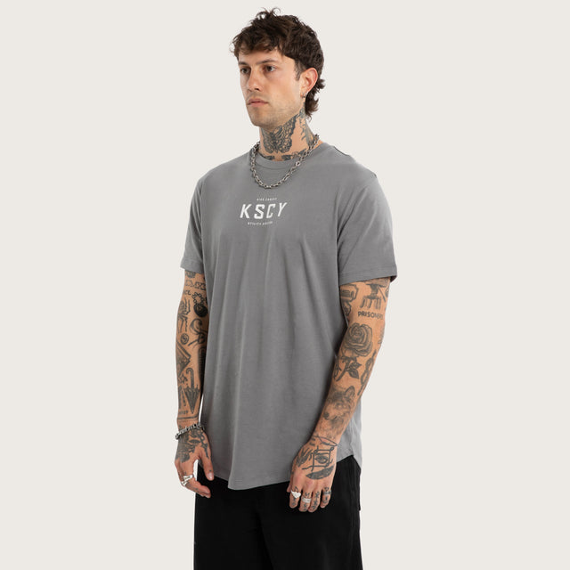 Model wears Division Dual Curved Tee Steel Grey T-Shirts Grey – image 3