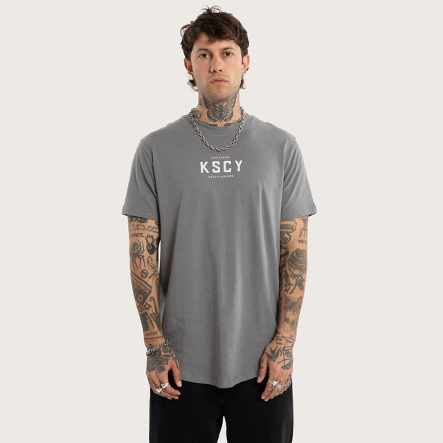 Model wears Division Dual Curved Tee Steel Grey T-Shirts Grey – image 1