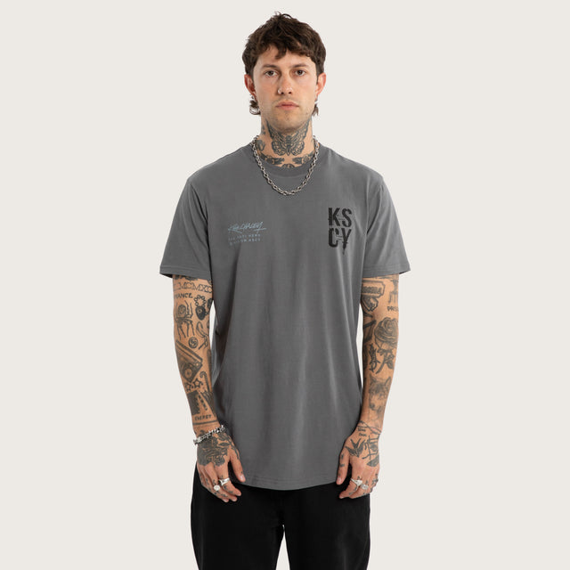 Model wears Cloak Dual Curved Tee Charcoal T-Shirts Grey – image 1