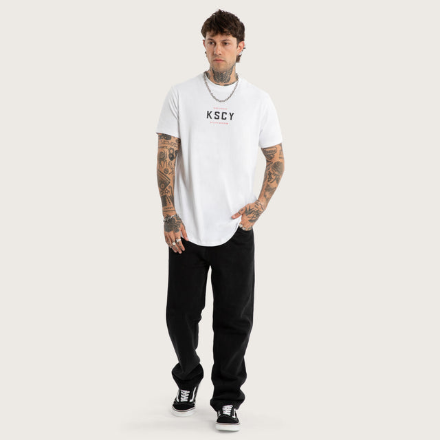 Model wears Stamp Dual Curved Tee Optical White T-Shirts White – image 5