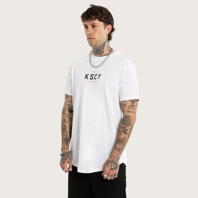 Model wears Stamp Dual Curved Tee Optical White T-Shirts White – image 3