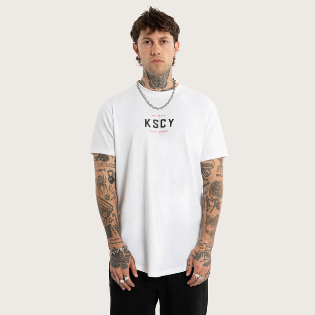 Model wears Stamp Dual Curved Tee Optical White T-Shirts White – image 1