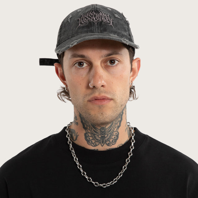 Model wears Veiled Dad Cap Jet Black Caps Black – image 2