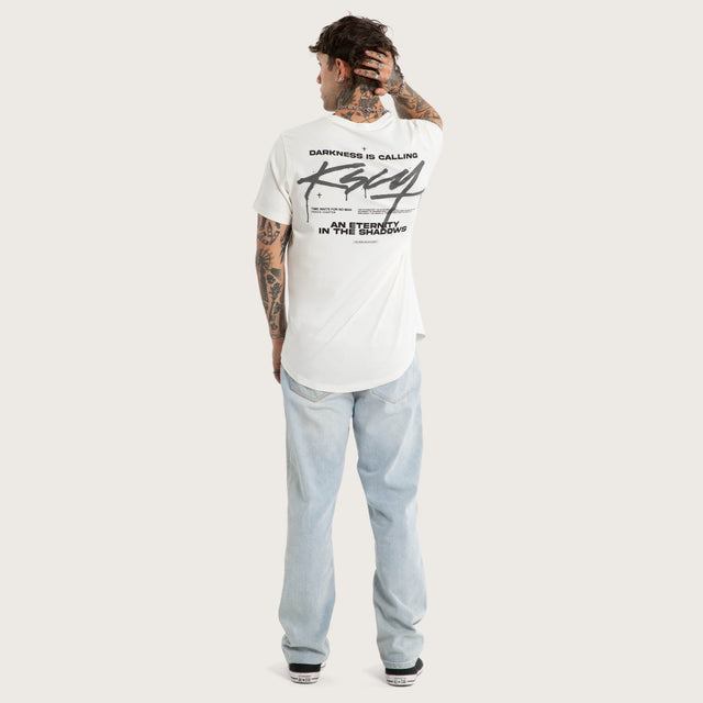 Model wears Prodigy Dual Curved Tee Natural White T-Shirts White – image 6