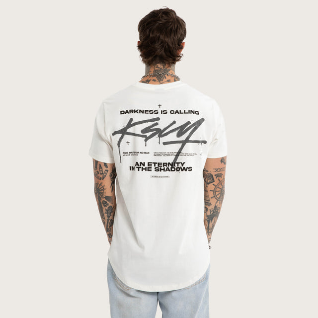Model wears Prodigy Dual Curved Tee Natural White T-Shirts White – image 2