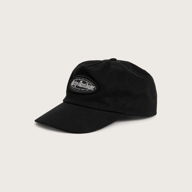 Model wears Detect Convoy Cap Jet Black Caps Black – image 2