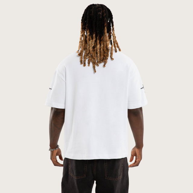 Model wears Goliath Loopback Street Tee Optical White T-Shirts White – image 5