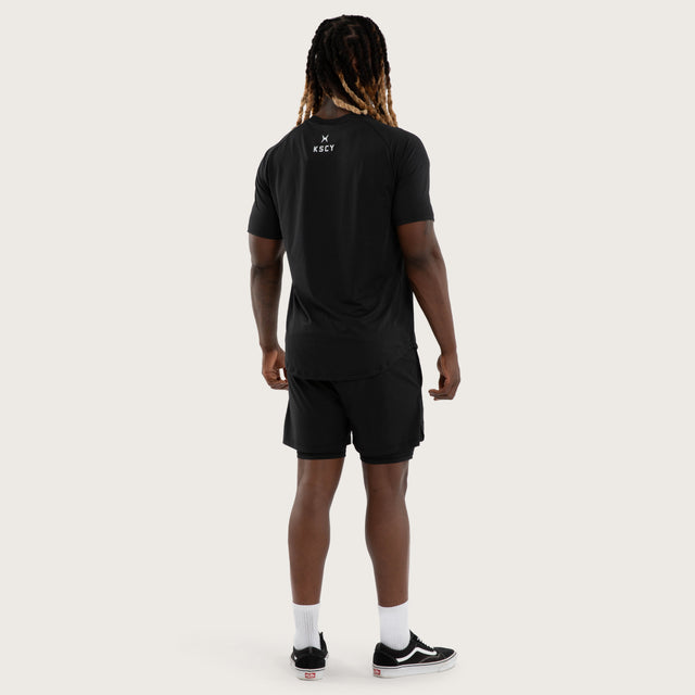 Model wears Fuel Training Raglan Tee Anthracite Black T-Shirts Black – image 2