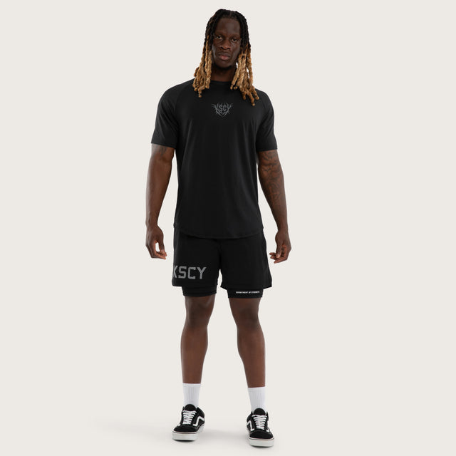Model wears Fuel Training Raglan Tee Anthracite Black T-Shirts Black – image 5