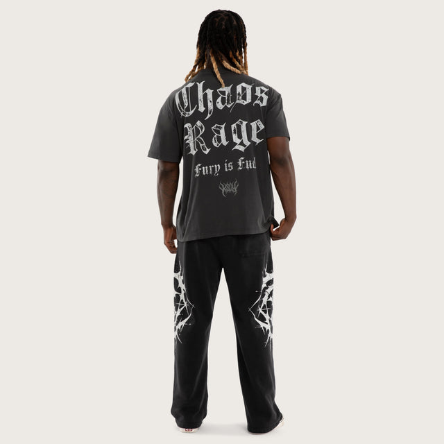 Model wears Creeper Pump Cover Raptor Tee Pigment Black T-Shirts Black – image 2