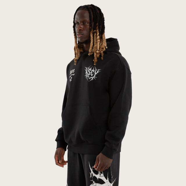 Model wears Fuel Training Relaxed Hoodie Black Hoodies Black – image 4