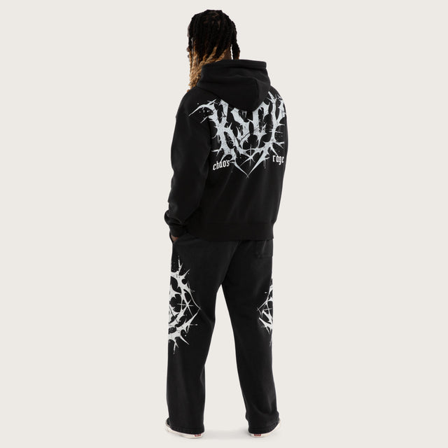 Model wears Fuel Training Relaxed Hoodie Black Hoodies Black – image 5