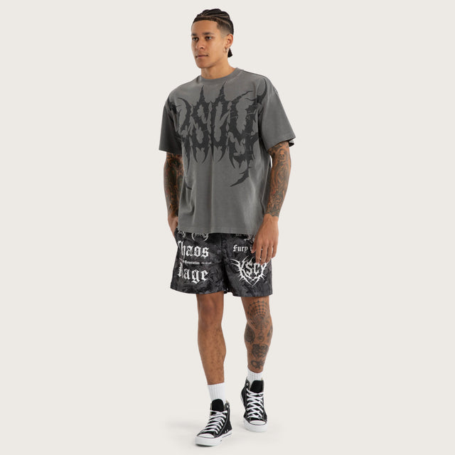 Model wears Chaos Rage Mesh Trackshort Dark Camo Activewear Trackpants in Camo - Image 5