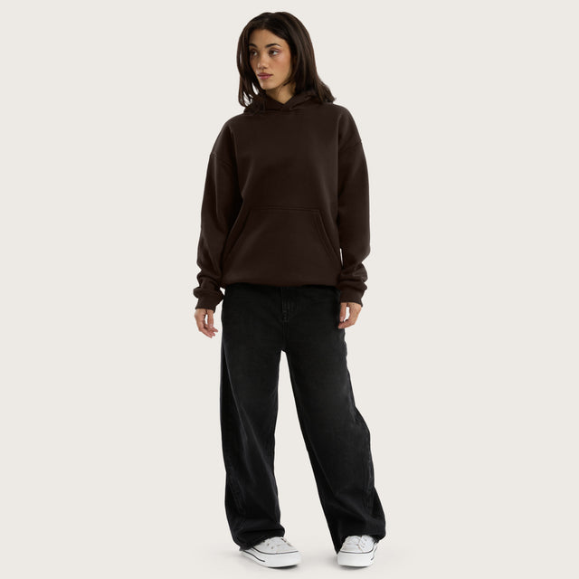 Model wears Weyburn Hoodie Dark Brown Hoodies in Brown - Image 4