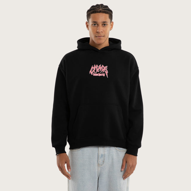 Model wears Melt Oversized Hoodie Jet Black Hoodies in Black - Image 2