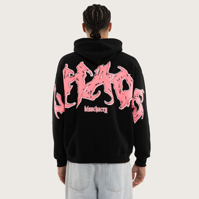 Model wears Melt Oversized Hoodie Jet Black Hoodies in Black - Image 1