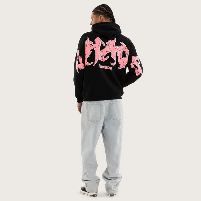 Model wears Melt Oversized Hoodie Jet Black Hoodies in Black - Image 4