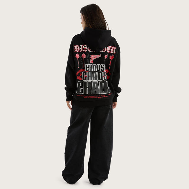 Model wears Trap Oversized Hoodie Jet Black Hoodies in Black - Image 6