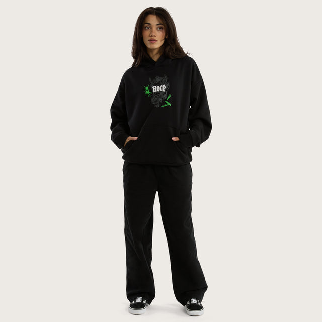 Model wears Wither Oversized Hoodie Jet Black Hoodies in Black - Image 6
