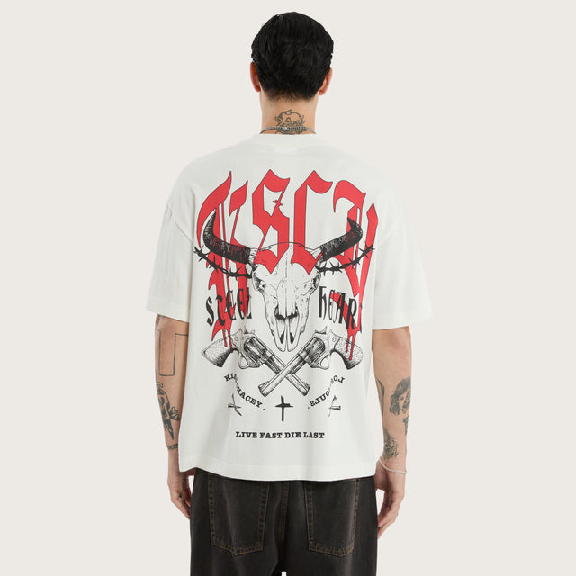 Model wears Steel Heart Heavyweight Box Fit Tee Natural White T-Shirts in White - Image 1