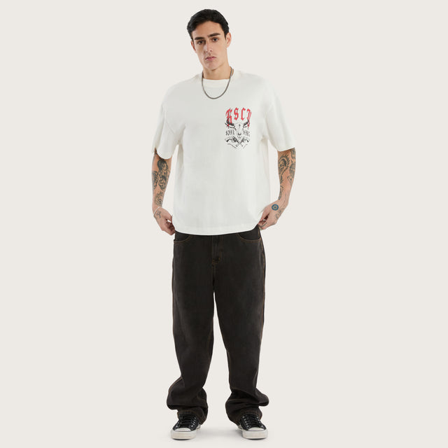 Model wears Steel Heart Heavyweight Box Fit Tee Natural White T-Shirts in White - Image 2
