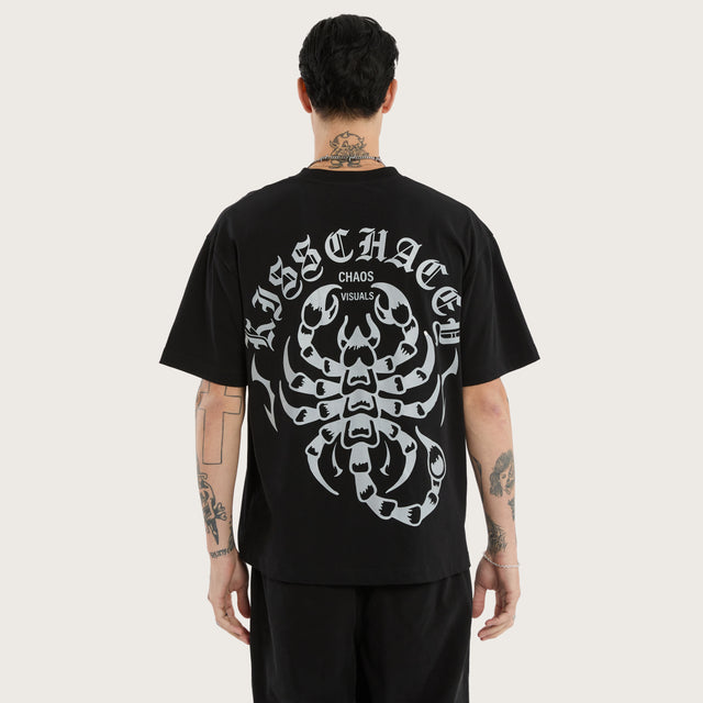 Model wears Sandtomb Heavyweight Box Fit Tee Jet Black T-Shirts in Black - Image 1