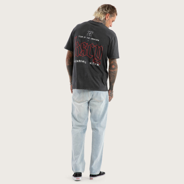Model wears Within Relaxed Fit Tee in Black T-Shirts in Black - Image 5