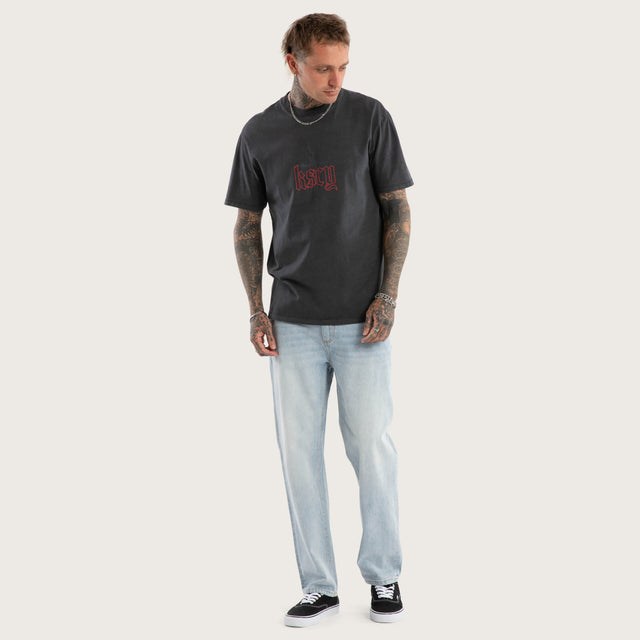 Model wears Within Relaxed Fit Tee in Black T-Shirts in Black - Image 2