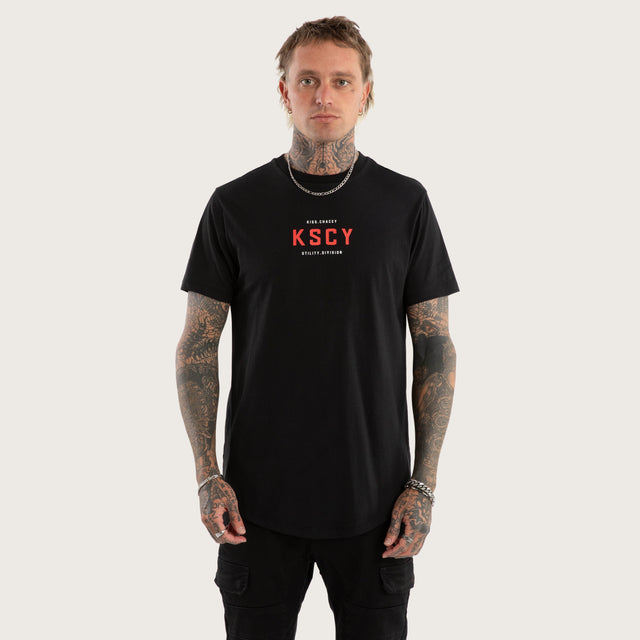 Model wears Stamp Curved Hem Tee Jet Black T-Shirts in Black - Image 3