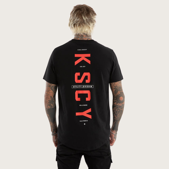 Model wears Stamp Curved Hem Tee Jet Black T-Shirts in Black - Image 1