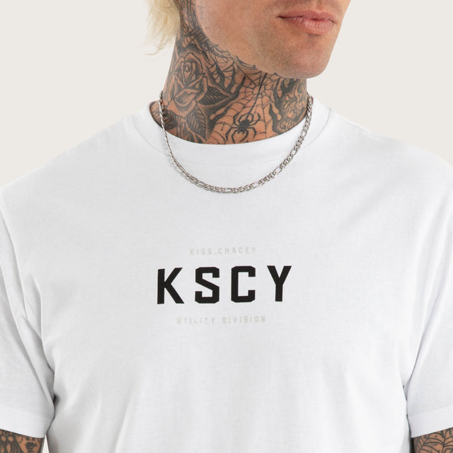 Model wears Stamp Curved Hem Tee in Optical White T-Shirts in White - Image 6