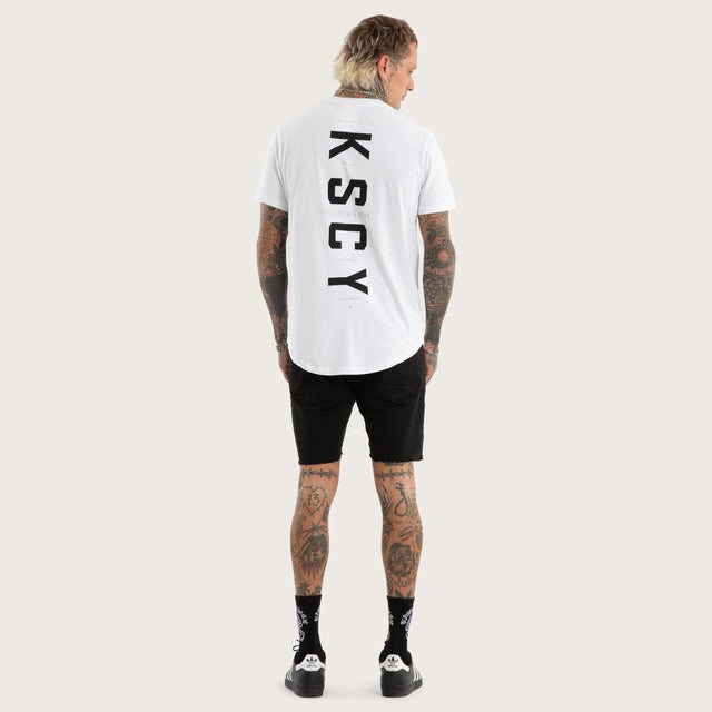 Model wears Stamp Curved Hem Tee in Optical White T-Shirts in White - Image 5