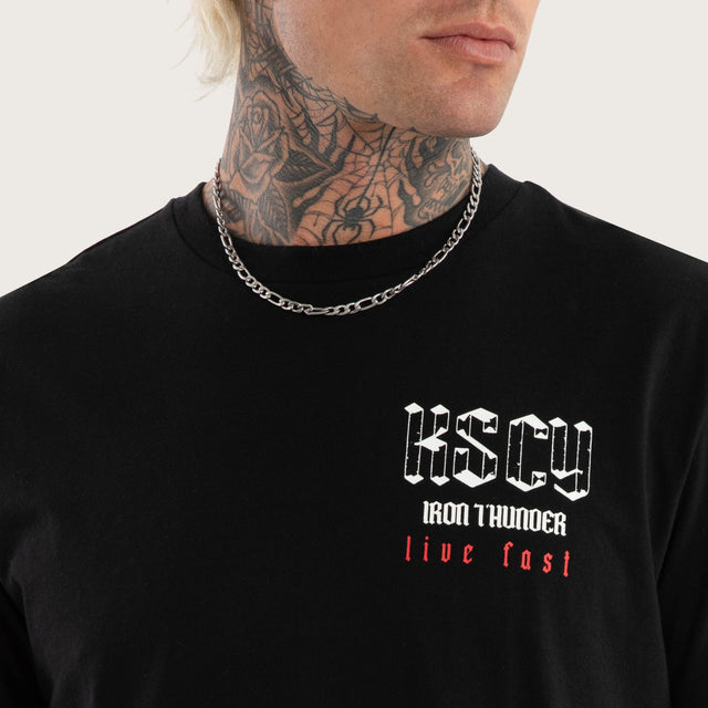 Model wears Iron Thunder Curved Hem Tee Jet Black T-Shirts in Black - Image 6
