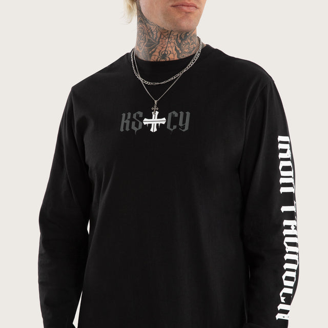 Model wears Tyres Curved Hem Longsleeve Tee Jet Black Longsleeve T-Shirts in Black - Image 6