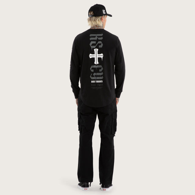 Model wears Tyres Curved Hem Longsleeve Tee Jet Black Longsleeve T-Shirts in Black - Image 5