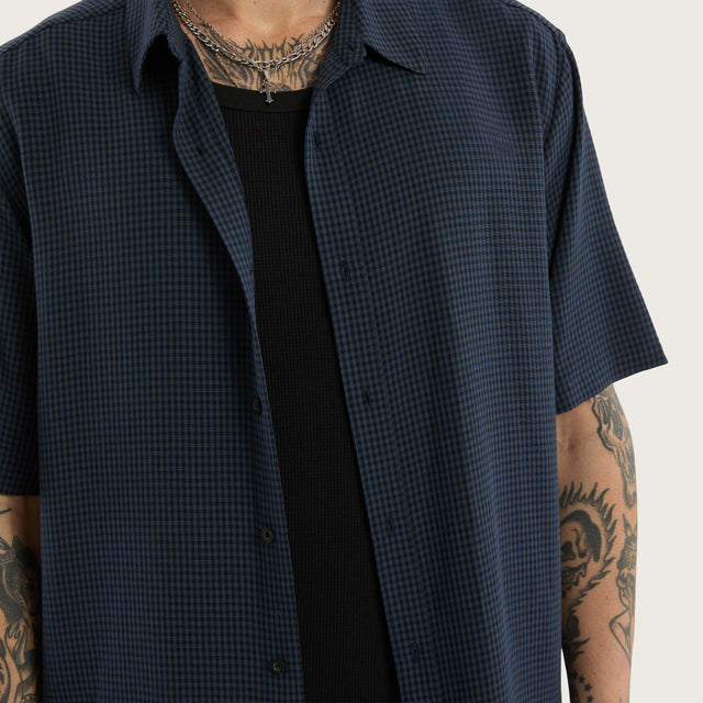 Model wears Longneck Short Sleeve Shirt in Blue Check Short Sleeve Shirts in Blue - Image 4