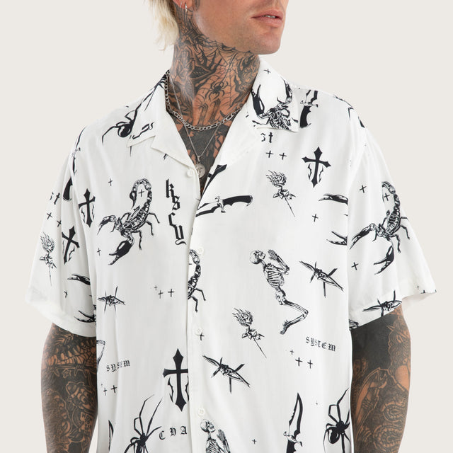 Model wears Scatter Resort Short Sleeve Shirt White Print Short Sleeve Shirts in White - Image 6