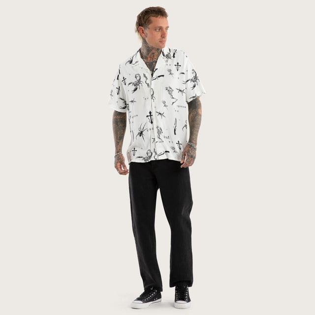 Model wears Scatter Resort Short Sleeve Shirt White Print Short Sleeve Shirts in White - Image 5