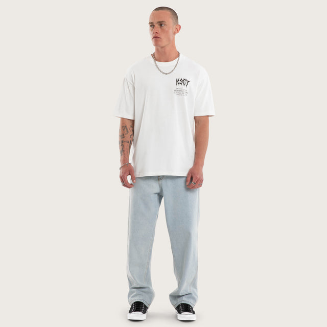 Model wears Fallen Box Fit Tee Natural White T-Shirts in White - Image 5