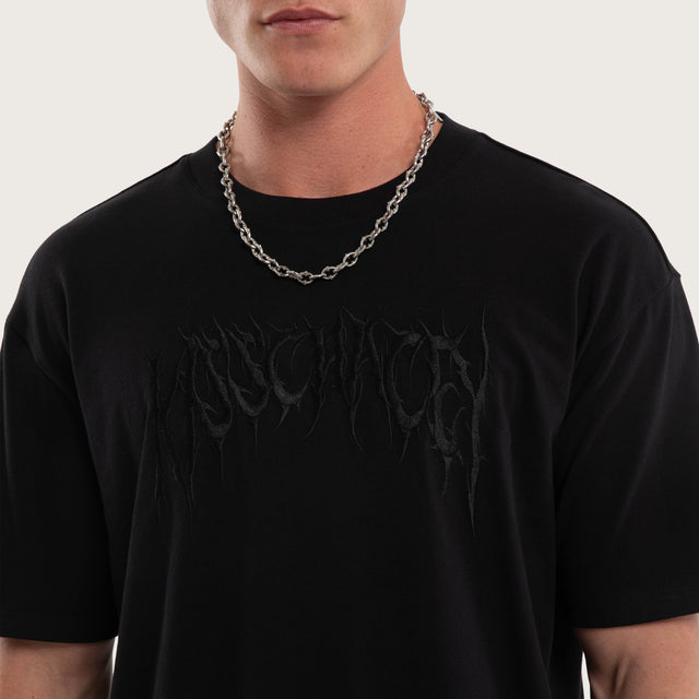 Model wears Mirage Box Fit Tee Jet Black T-Shirts in Black - Image 3