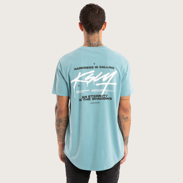 Model wears Prodigy Dual Curved Tee Pigment Cameo T-Shirts in Blue - Image 2