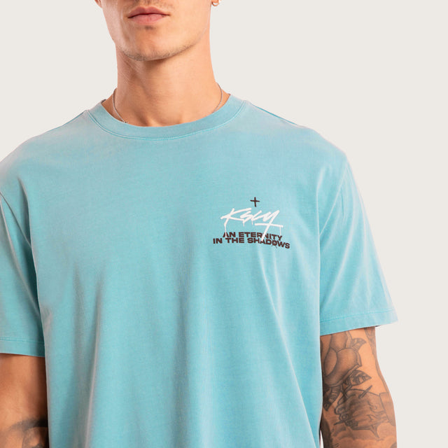 Model wears Prodigy Dual Curved Tee Pigment Cameo T-Shirts in Blue - Image 3