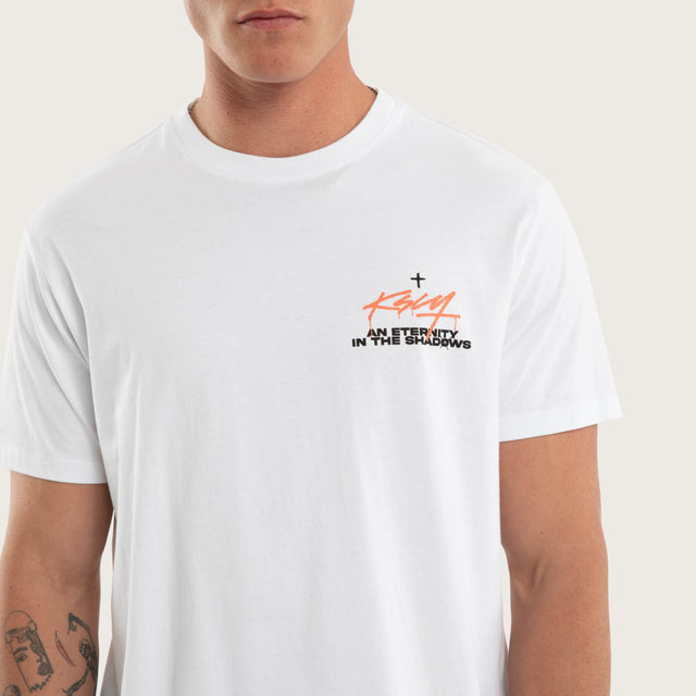 Model wears Prodigy Dual Curved Tee White T-Shirts in White - Image 3