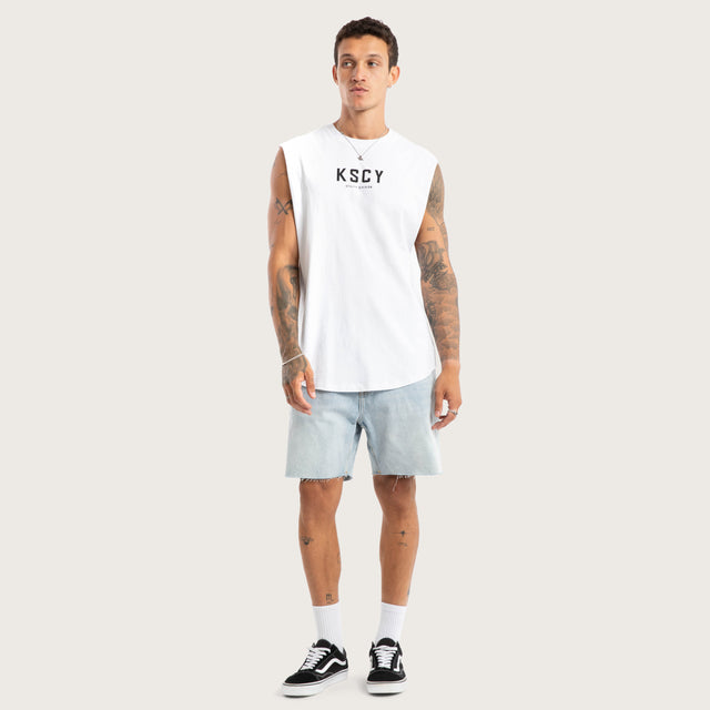 Model wears Visualise Curved Hem Muscle Tee White Muscle Tees in White - Image 4