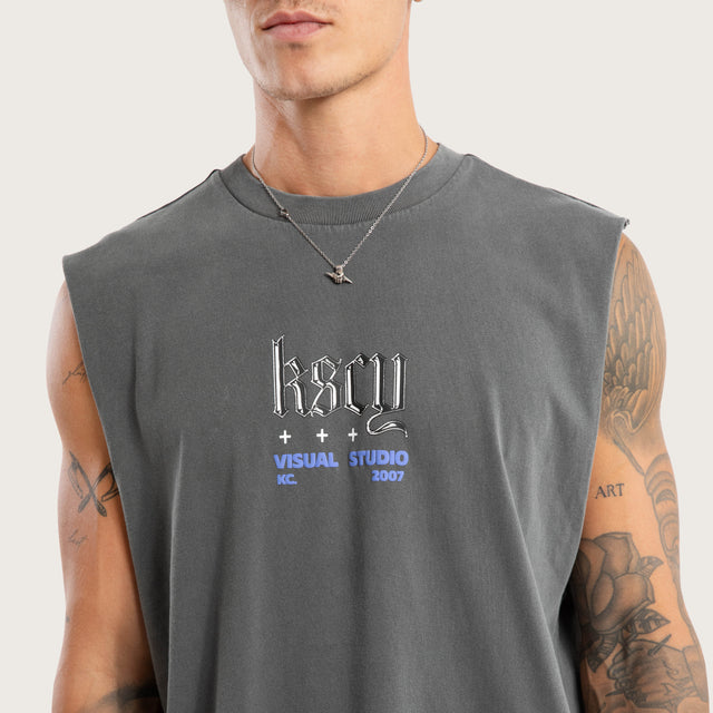 Model wears Studio Relaxed Muscle Pigment Charcoal Muscle Tees in Grey - Image 3